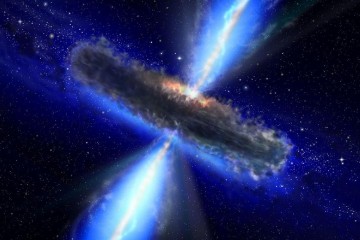 An artist's rendition of a feeding black hole - known as a quasar -similar to APM 08279+5255, the site for the largest and most distant resivoir of water observed to date.
Photo by: NASA/ESA