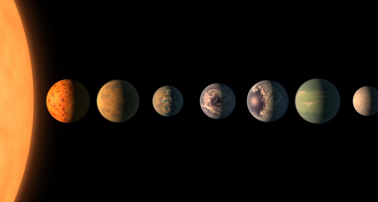 An artist's rendition of the TRAPPIST 1 system. The four inner exoplanets all lie in the habitable zone, with three potentially hosting liquid water.
Photo by: NASA, JPL